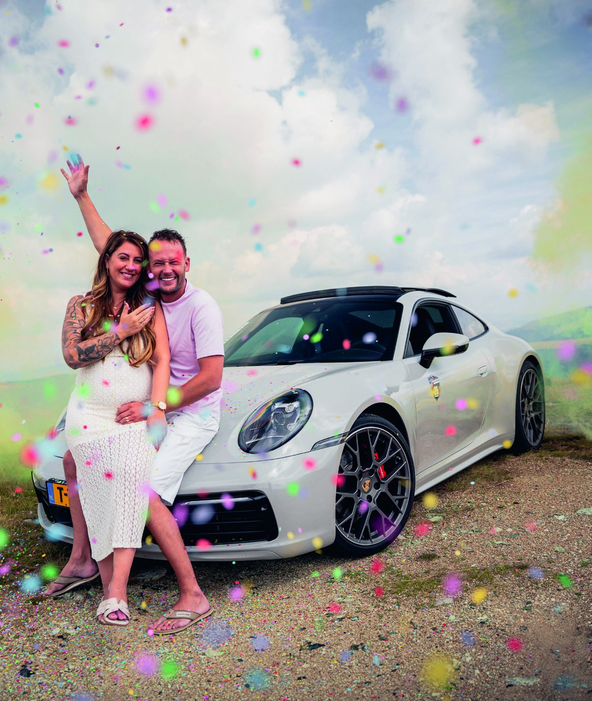 Cédric Marchant and his partner Daphne celebrate their engagement beside the Porsche during DreamDrive Transylvania.